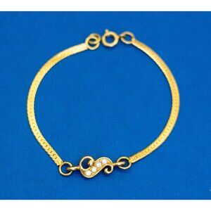 7 inch, Vintage Gold Tone Wavy Rhinestones Victorian Bracelet by Avon D3